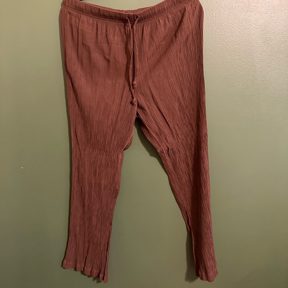 These brown pants are textured, yet can be dressed up! Flowy at the bottom.